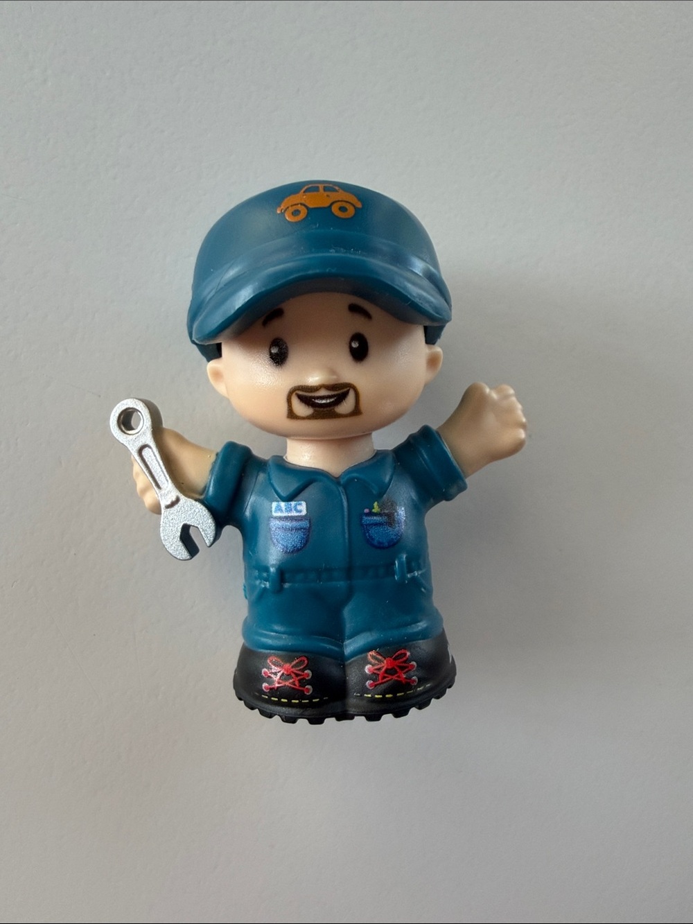 Fisher-Price Little People Auto Mechanic holding wrench
